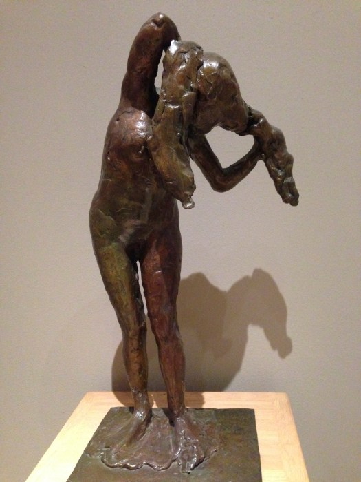 Woman arranging her hair.  Degas. Norton Simon Museum , Pasadena.